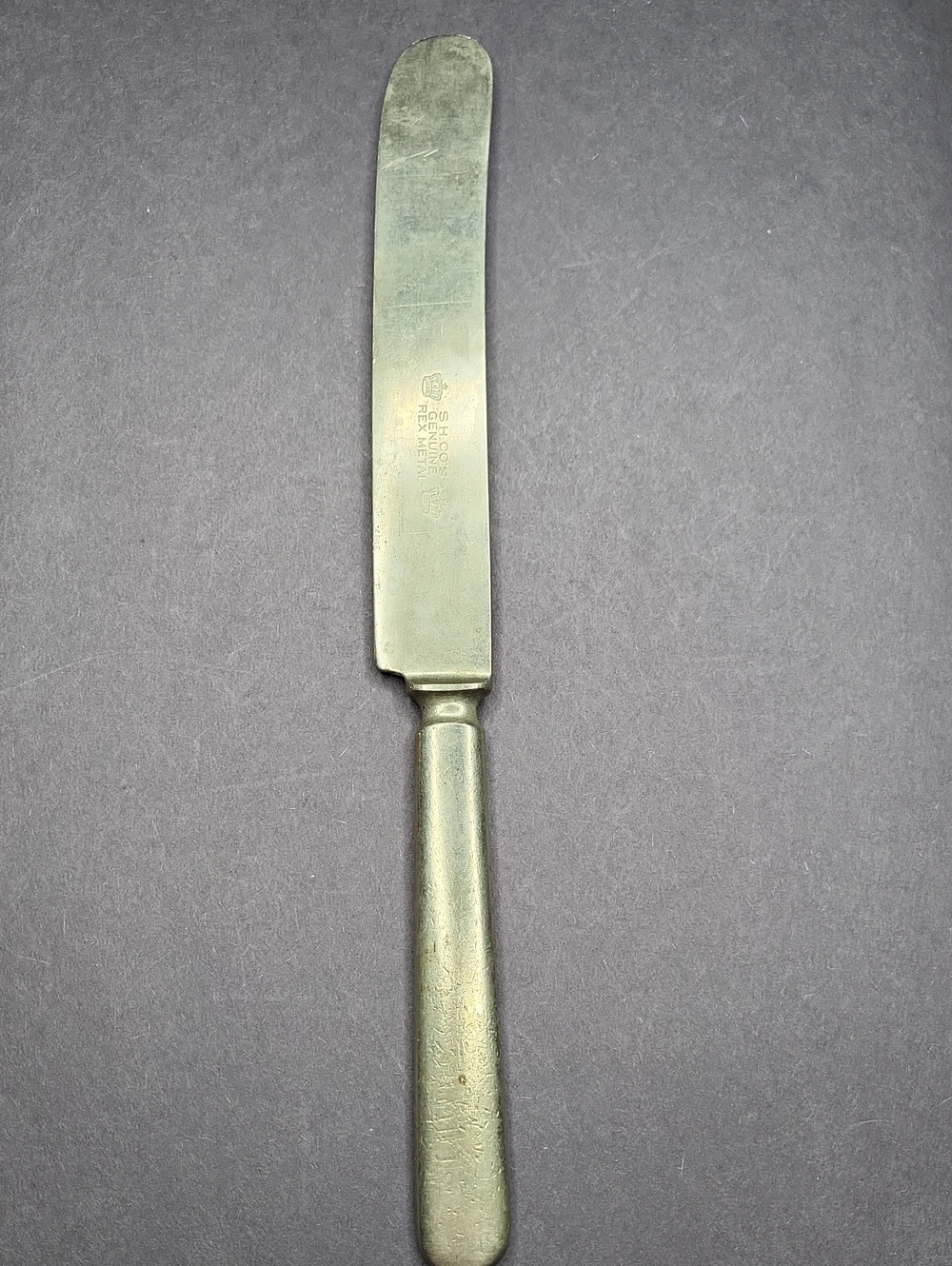 Stainless Butter Knife with Embossed Maker's Mark - Silver Tone